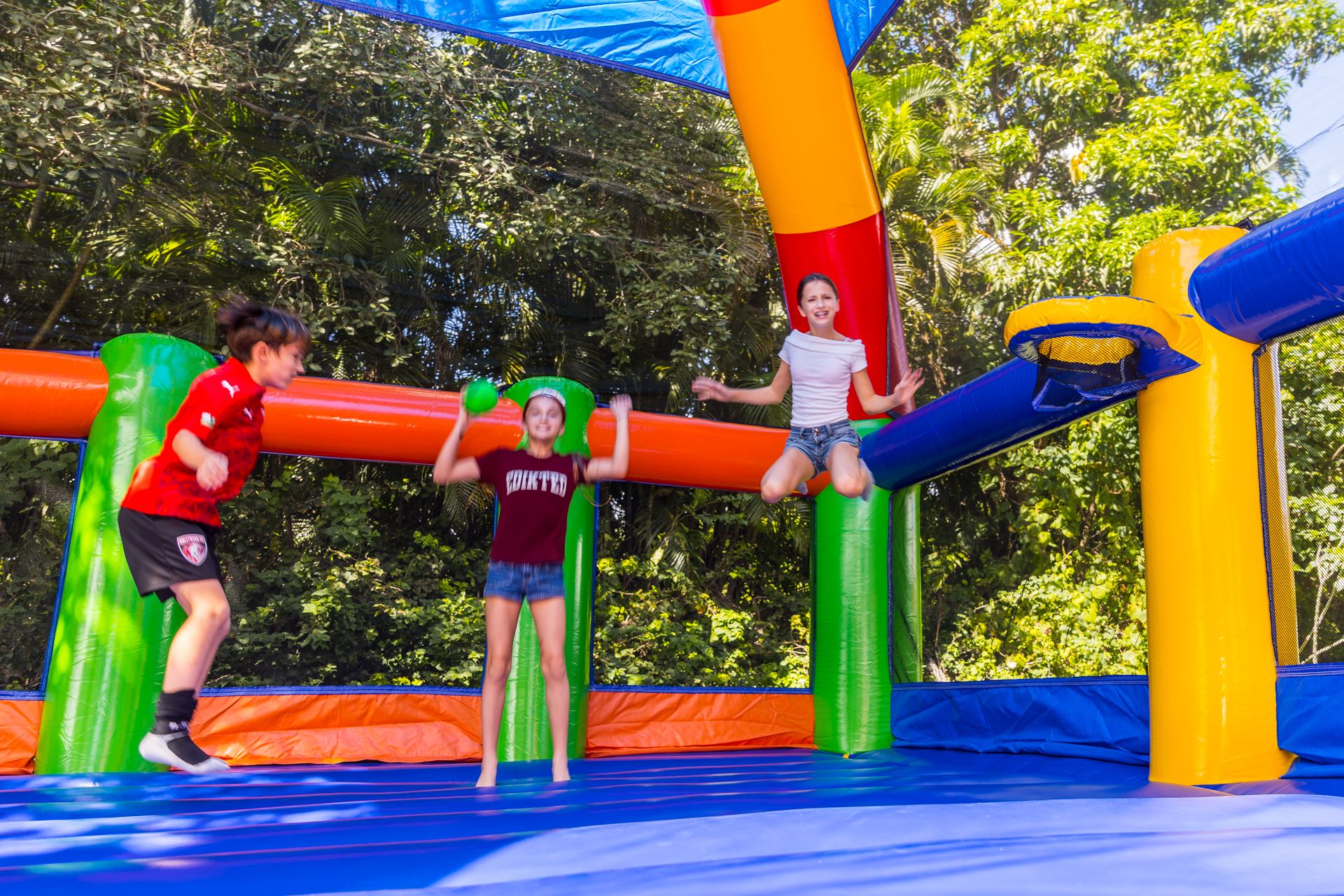 Children jumping on the big inflatable trampoline